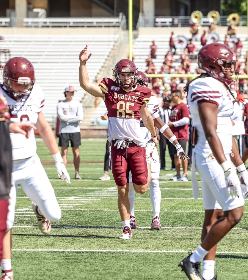 Brooks McCoy playing football for the Texas State Bobcats